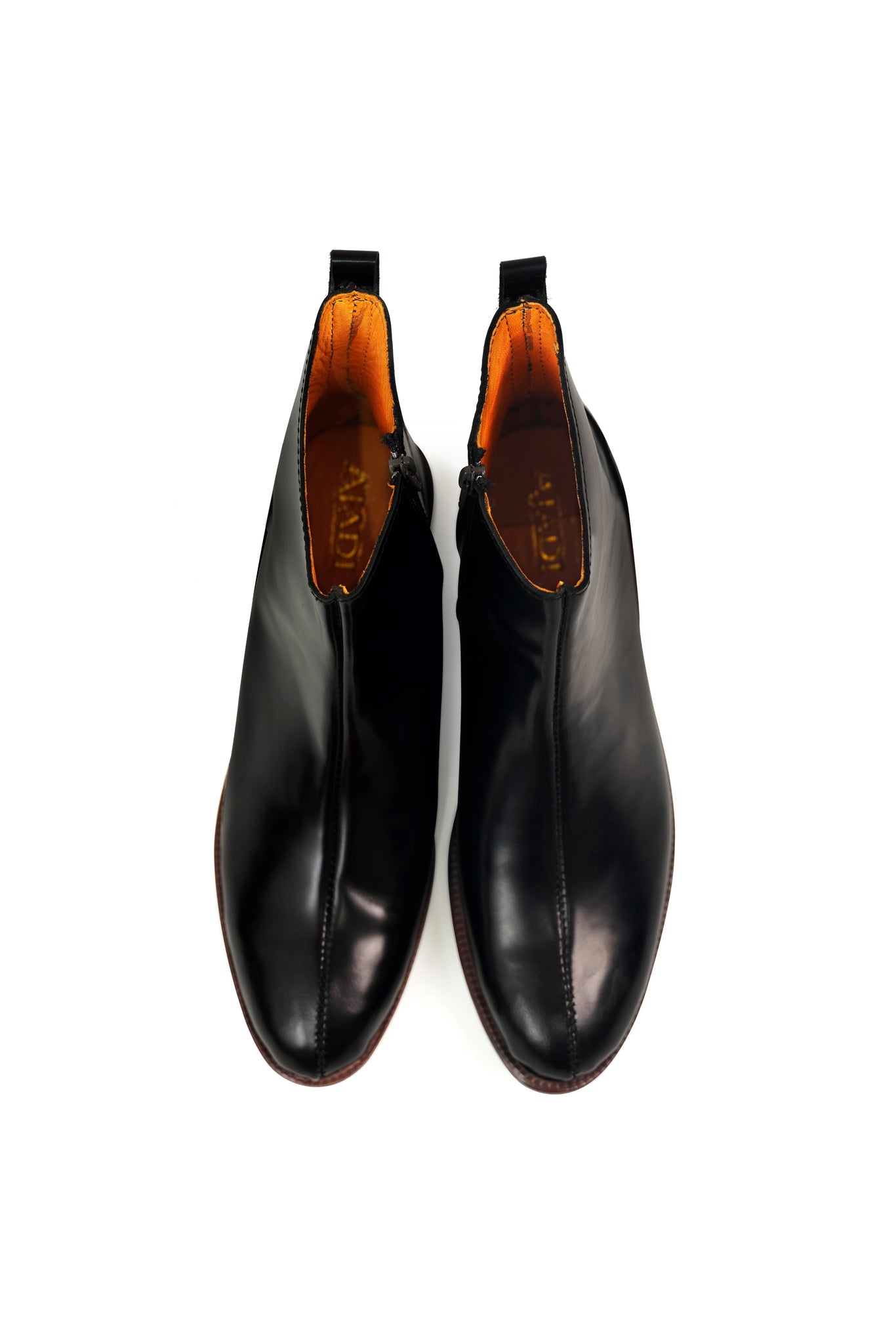 Ajadi Boots in Black Leather with Side Zipper and Brown Leather Soles