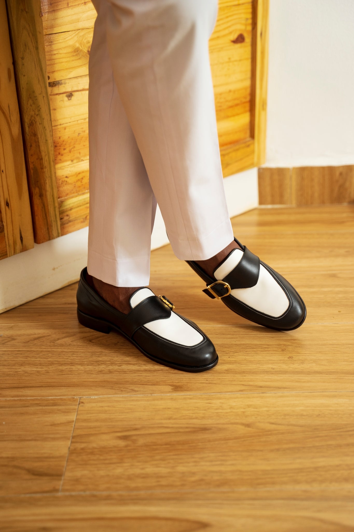 Ajadi Loafers in Black and White Leather with Black Strap Buckle