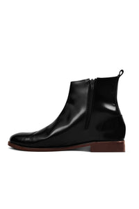 Ajadi Boots in Black Leather with Side Zipper and Brown Leather Soles